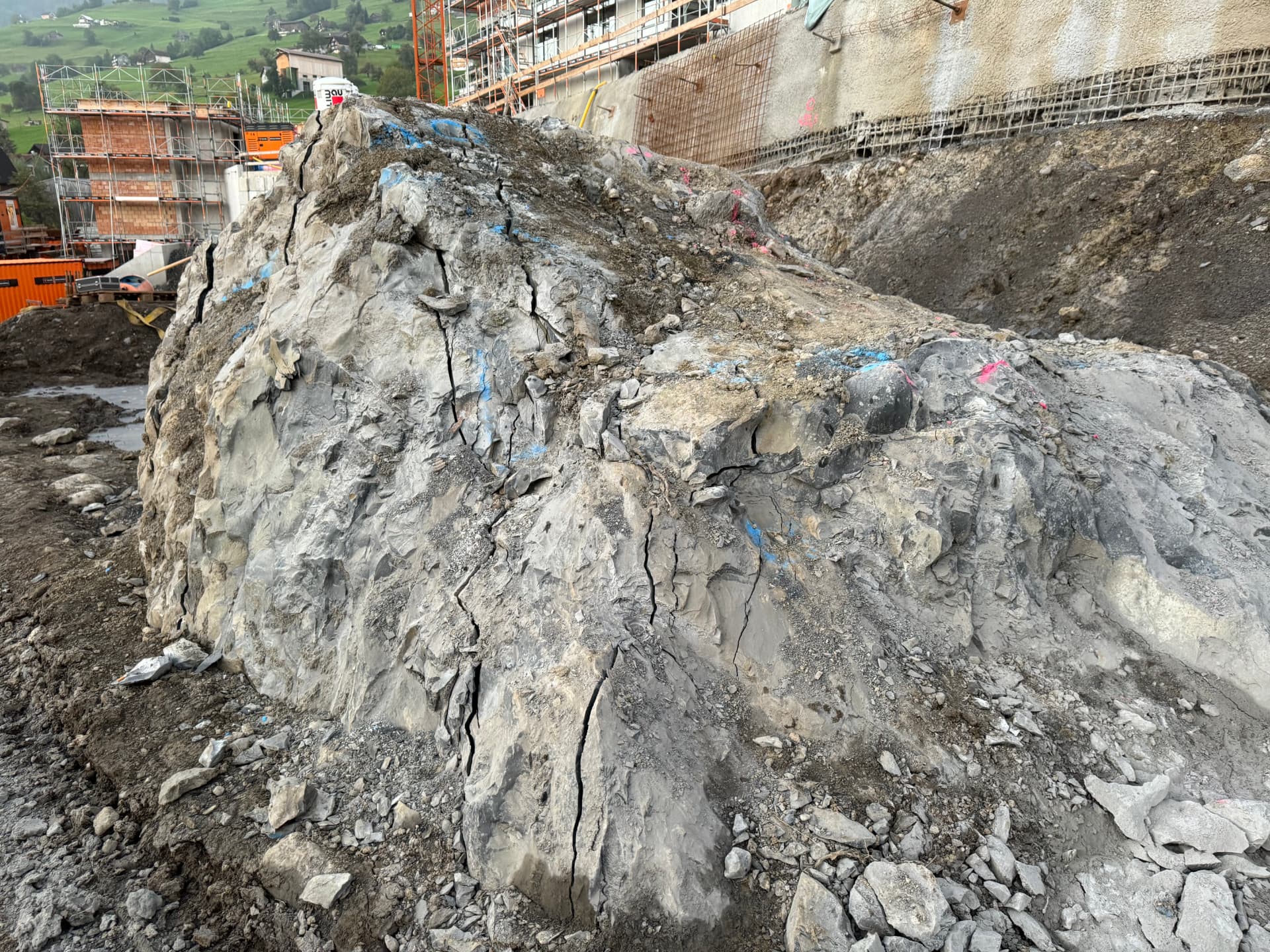 Large boulder in the excavation cracked right through