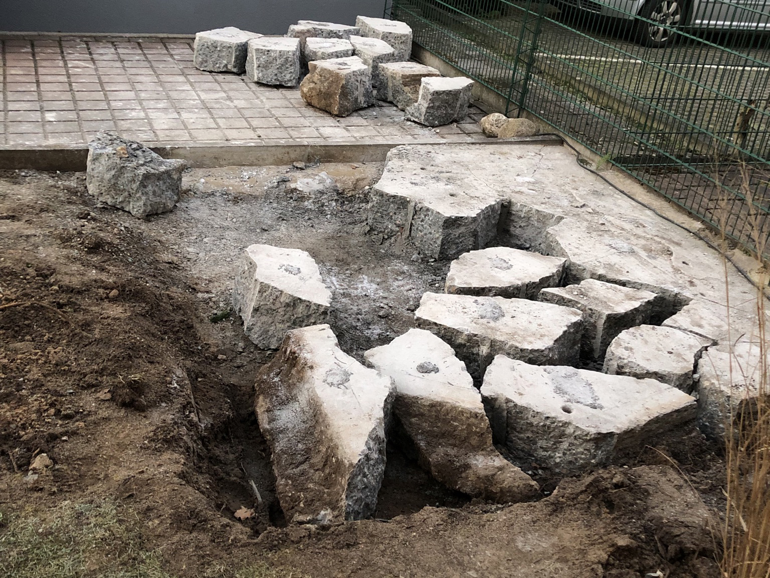 Concrete slab split precisely into removable pieces