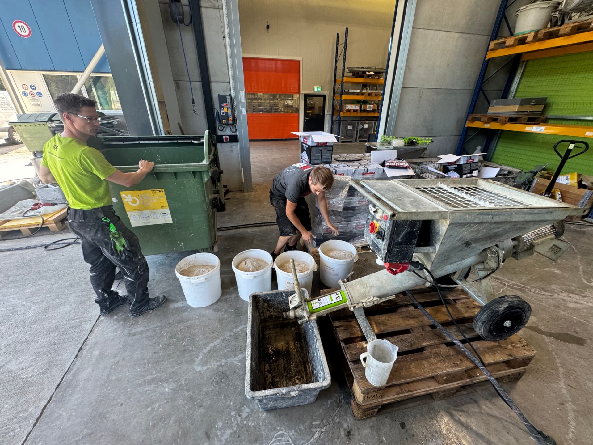 Mixing unit with hopper and screw pump during testing at MAI International in Carinthia