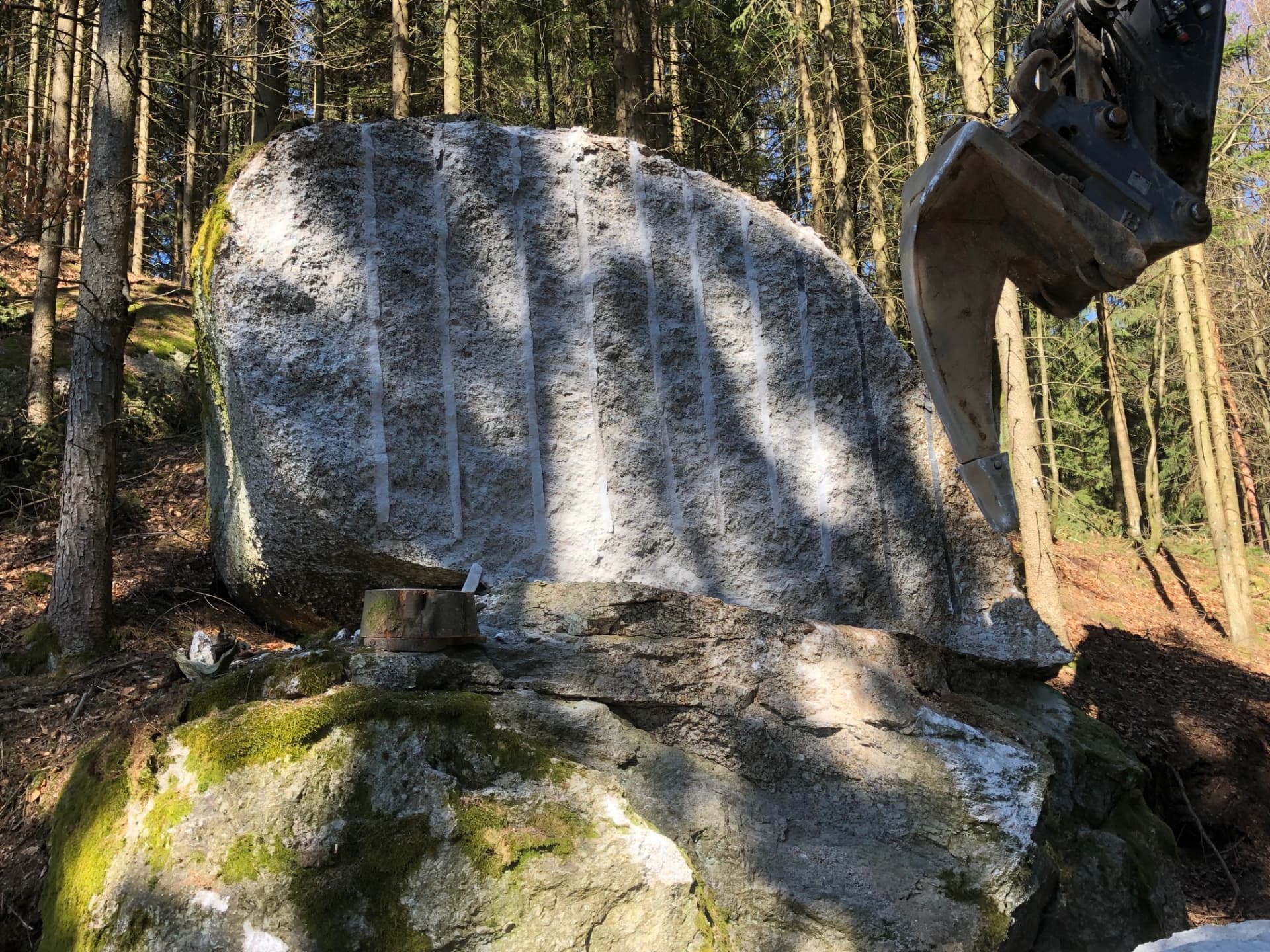 Boulder in the forest separated into slices – without noise or vibration