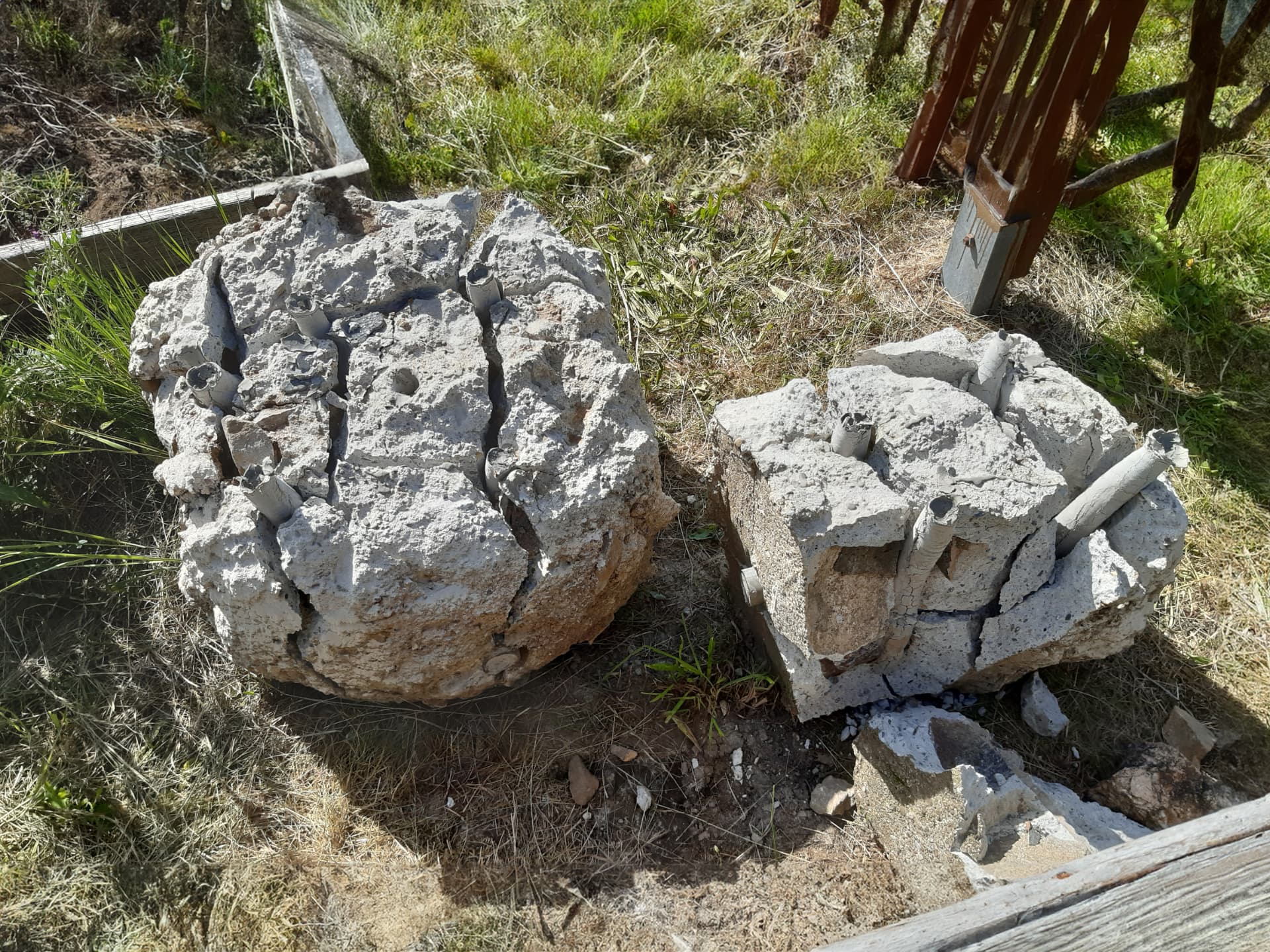Concrete foundation blocks fully broken up via a grid of drill holes
